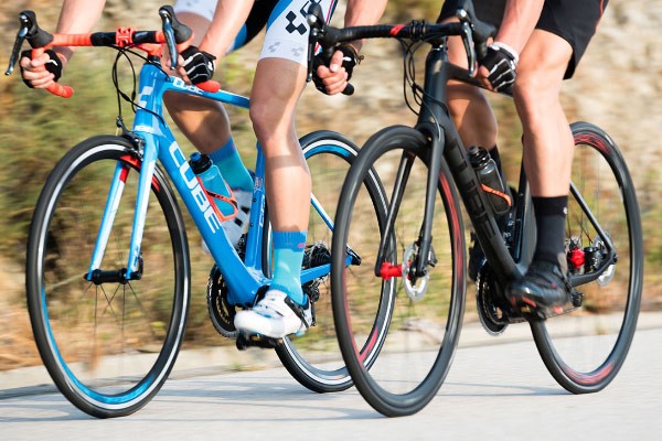 Two road Cube road bikes shown from a angled view